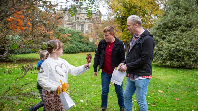 Visitors on the Autumn Adventure trail in the garden at Seaton Delaval Hall, Northumberland